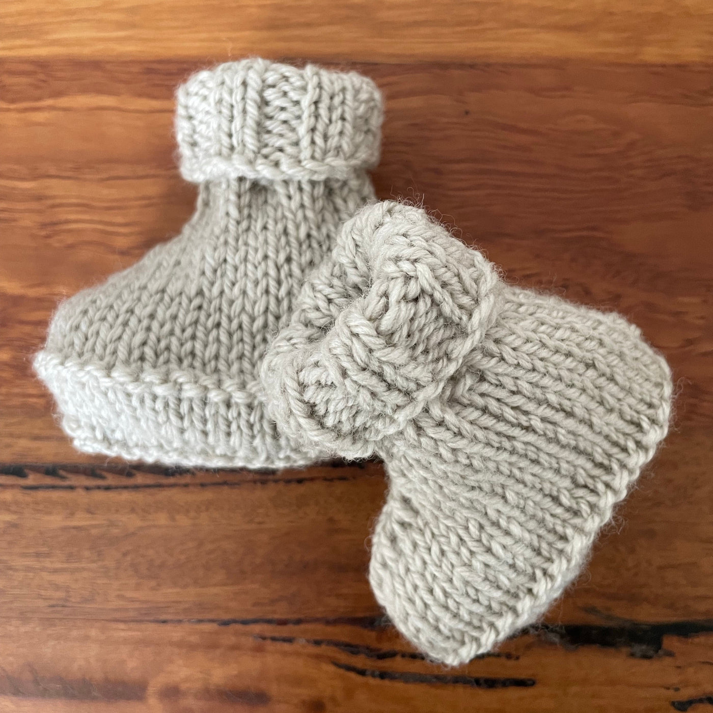 Stone coloured baby booties